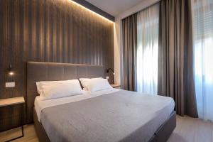 Cama o camas de una habitación en Blu Notte Guest House