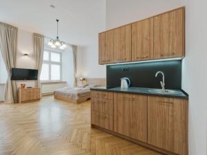Kuchyňa alebo kuchynka v ubytovaní Krakow For You Budget Apartments