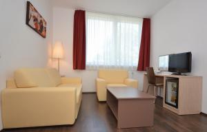 TV a/nebo společenská místnost v ubytování Hotel Opal Superior - Adults Only