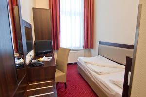 Cama o camas de una habitación en Novum Hotel Graf Moltke Hamburg