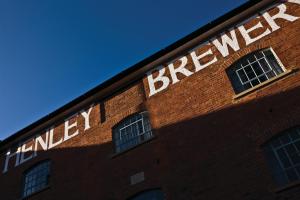a sign on the side of a brick building at Hotel du Vin Henley in Henley on Thames +90 photos