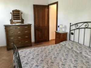 Posteľ alebo postele v izbe v ubytovaní Agriturismo Marinello