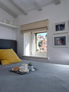 Ein Bett oder Betten in einem Zimmer der Unterkunft Luxury Apartment Bifora
