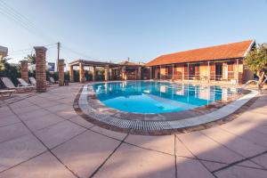 The swimming pool at or close to HYGGE Corfu