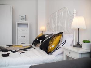Postel nebo postele na pokoji v ubytování GIN apartman