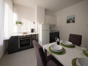 Kuchyň nebo kuchyňský kout v ubytování GIN apartman