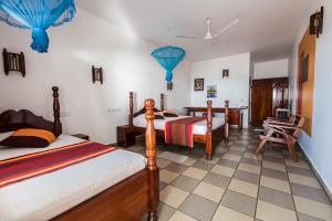 Postel nebo postele na pokoji v ubytování Ypsylon Tourist Resort + 37 fotografií