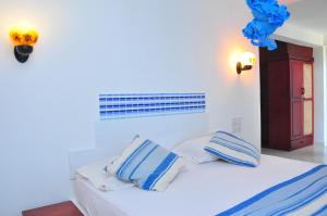 Voodi või voodid majutusasutuse Ypsylon Tourist Resort toas