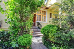 a house with stairs leading up to a door at TOMOVI HOME - Three bedrooms City center in Plovdiv