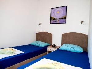 A bed or beds in a room at Apartment Cvijanović