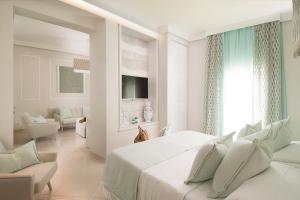 Ένα ή περισσότερα κρεβάτια σε δωμάτιο στο San Michele Suite