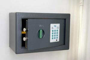 a lightswitch on a wall attached to a wall at Sweet Home Appartamenti in Bellaria-Igea Marina