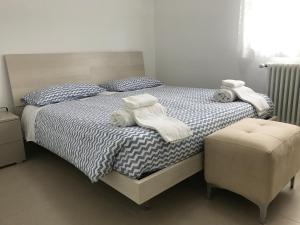 Кровать или кровати в номере Residence Bonelli