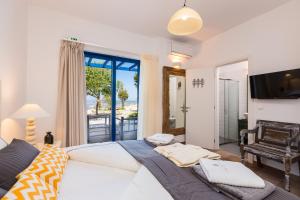 Postel nebo postele na pokoji v ubytování Villa Blanca Collection + 77 fotografií