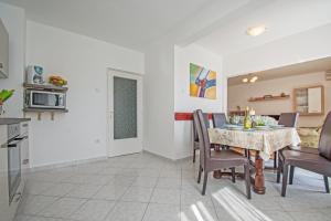 Kuchyň nebo kuchyňský kout v ubytování Apartment Marty