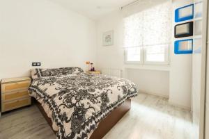 Cama o camas de una habitación en Apartamento Condes de Barcelona