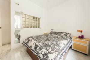 Ліжко або ліжка в номері Apartamento Condes de Barcelona