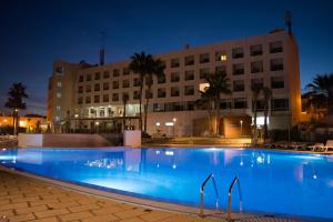 a large swimming pool in a large building at AP Maria Nova Lounge - Adults Friendly in Tavira