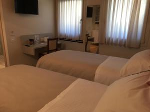 Ένα ή περισσότερα κρεβάτια σε δωμάτιο στο Residenza Ai Capitelli