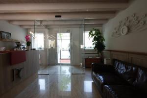 Χώρος καθιστικού στο Residenza Ai Capitelli