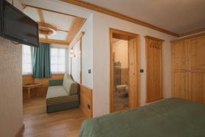 Postel nebo postele na pokoji v ubytování Hotel Centrale