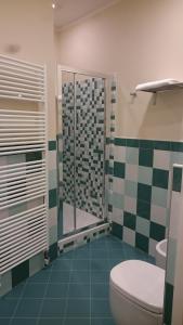 A bathroom at Casa Isolani Luxury Rooms Piazza Maggiore 1