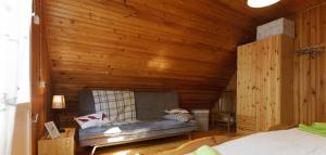 Postel nebo postele na pokoji v ubytování Poilsio baze