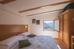 Postel nebo postele na pokoji v ubytování Hotel Centrale + 37 fotografií
