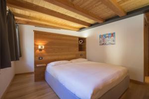 Postel nebo postele na pokoji v ubytování Hotel Centrale