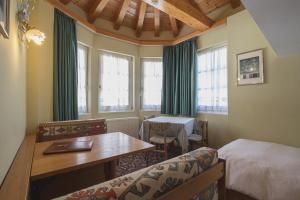 Postel nebo postele na pokoji v ubytování Hotel Centrale
