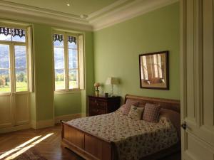 Säng eller sängar i ett rum på Chateau de La Lanette