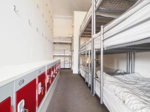 a row of bunk beds in a dorm room at The Hostel in Edinburgh