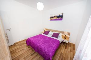 Postel nebo postele na pokoji v ubytování Apartment Miracool