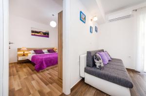 Postel nebo postele na pokoji v ubytování Apartment Miracool