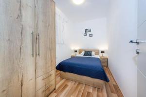 Postel nebo postele na pokoji v ubytování Apartment Miracool