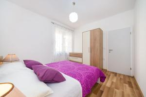 Postel nebo postele na pokoji v ubytování Apartment Miracool