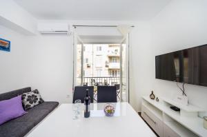 TV a/nebo společenská místnost v ubytování Apartment Miracool