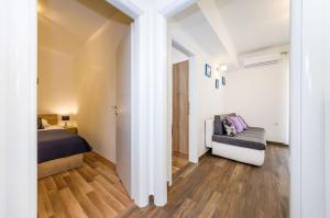 Postel nebo postele na pokoji v ubytování Apartment Miracool