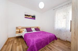 Postel nebo postele na pokoji v ubytování Apartment Miracool