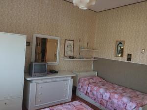 TV a/nebo společenská místnost v ubytování B&B Dai Nonni