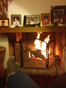 
a fireplace that has a fire place in it at La casa de Silvia in Puerto Madryn
