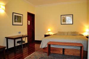 Postel nebo postele na pokoji v ubytování Boutique Hotel Casa Foch