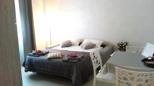 Postel nebo postele na pokoji v ubytování Residenze Principe Amedeo