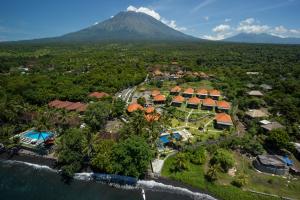 an aerial view of a resort with a mountain in the background at Ocean View Tulamben Dive & Resort in Tulamben