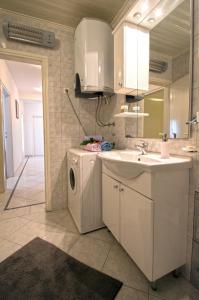 Kuchyň nebo kuchyňský kout v ubytování Apartment Marty