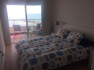 Łóżko lub łóżka w pokoju w obiekcie Apartments Campello
