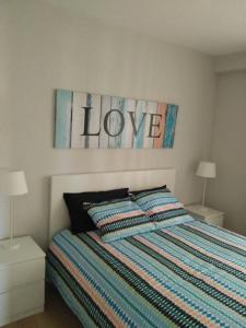 Łóżko lub łóżka w pokoju w obiekcie Apartments Campello