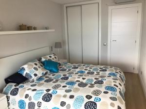 Łóżko lub łóżka w pokoju w obiekcie Apartments Campello