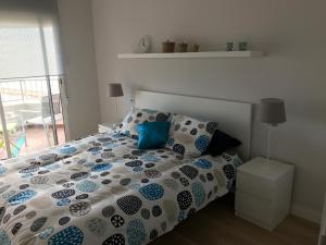 Łóżko lub łóżka w pokoju w obiekcie Apartments Campello