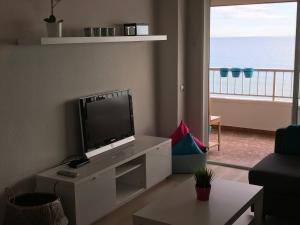 Telewizja i/lub zestaw kina domowego w obiekcie Apartments Campello